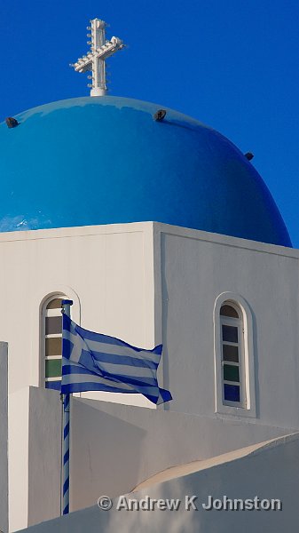 1009_40D_9601.JPG - Church dome and Greek flag at Firostephani, Santorini. I was still trying to get the Greek flag right!